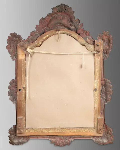 Miroir en métal repoussé et bronze doré, Allemagne vers 1750