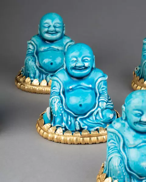 Collection de huit figures de Budai en biscuit turquoise, Chine 18 ème