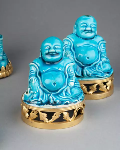 Collection de huit figures de Budai en biscuit turquoise, Chine 18 ème